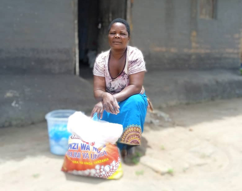Magret Moffat learns about Microloans and Building Business Skills in Malawi
